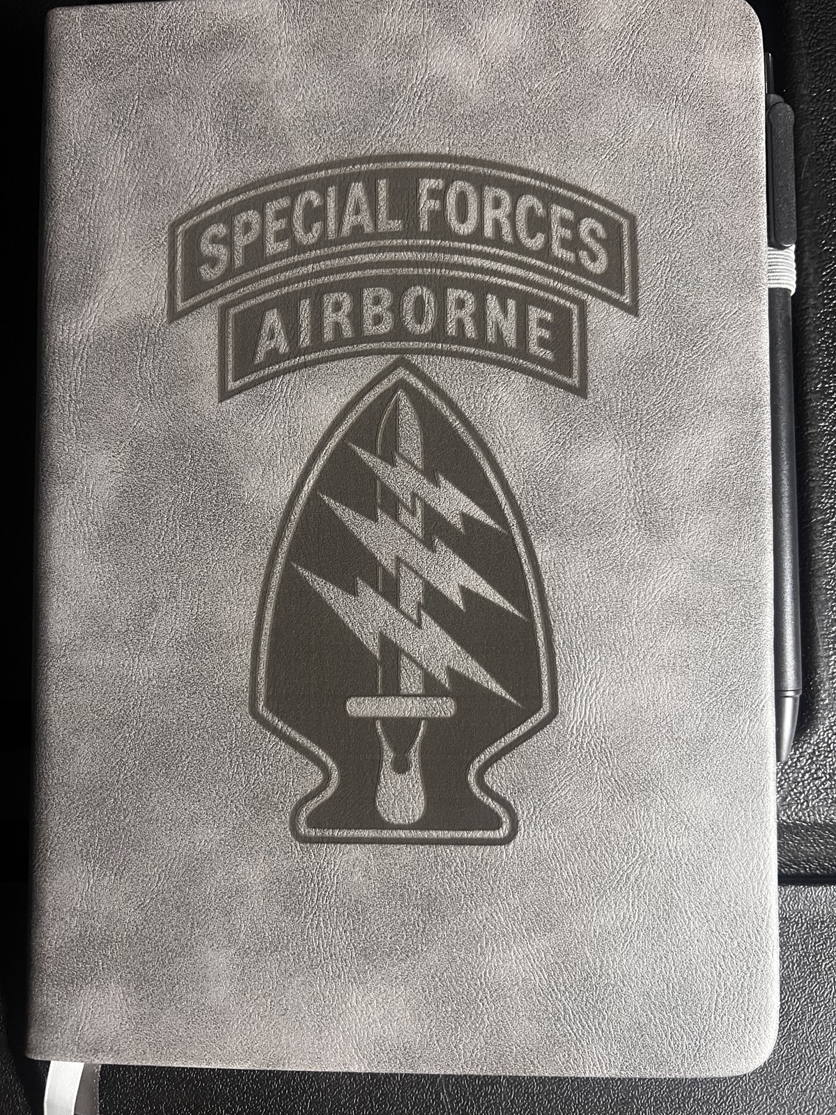 Insignia engraving by Robo-Top Inc.